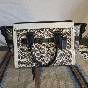 Coach Swagger 27 in snakeskin print leather.